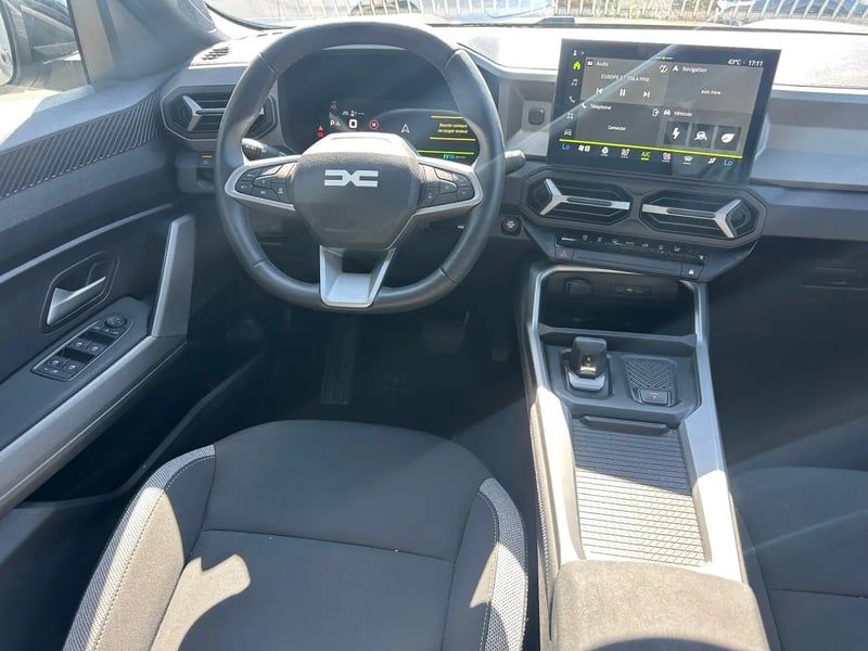 Photo de la voiture DACIA BIGSTER HYBRID 155 Journey