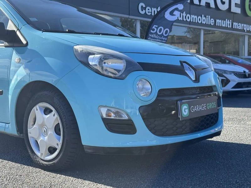 Photo de la voiture RENAULT TWINGO II 1.2 LEV 16v 75 eco2 Authentique